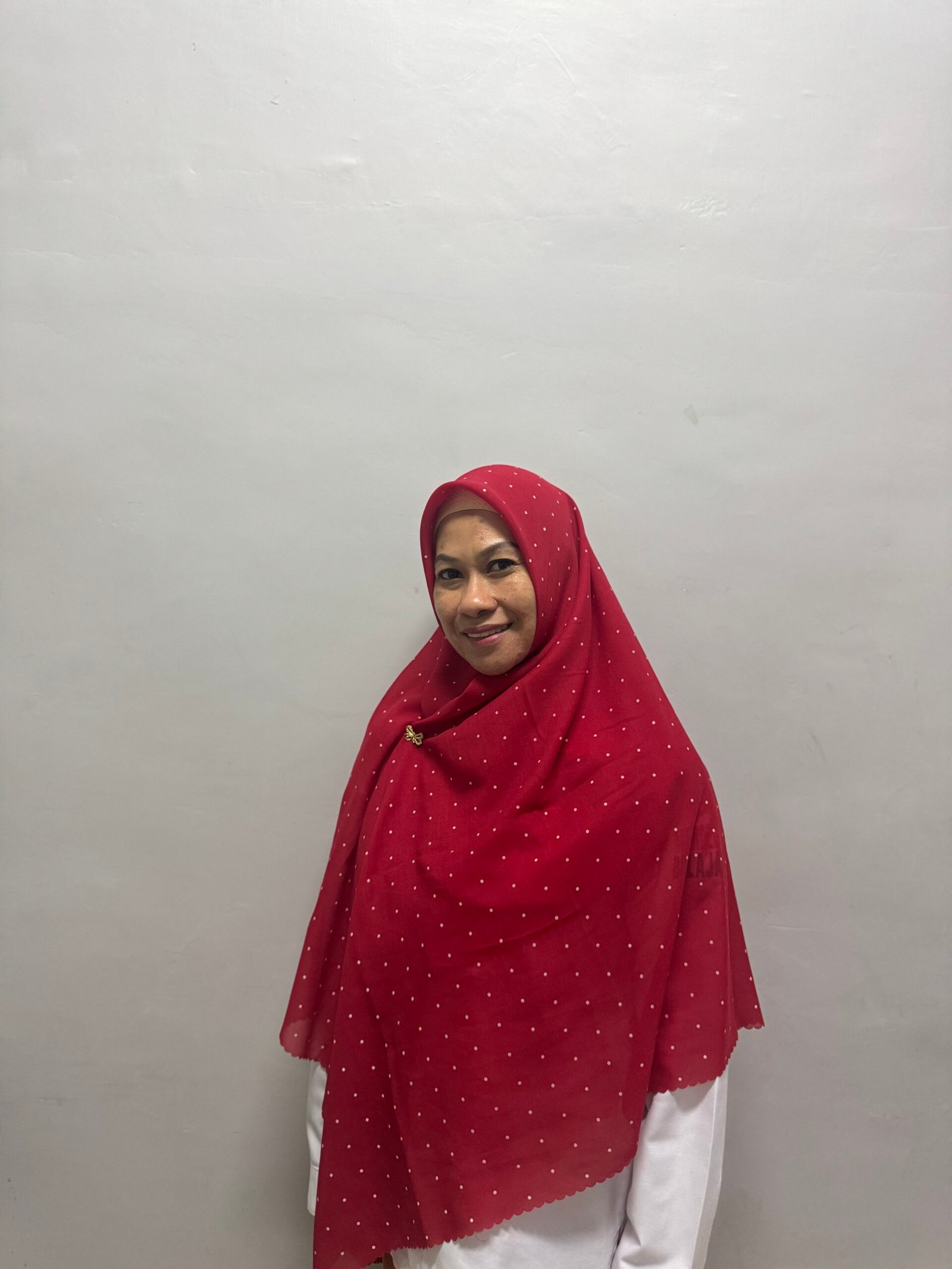 A. FITRIAH SYARIFUDDIN, S.S